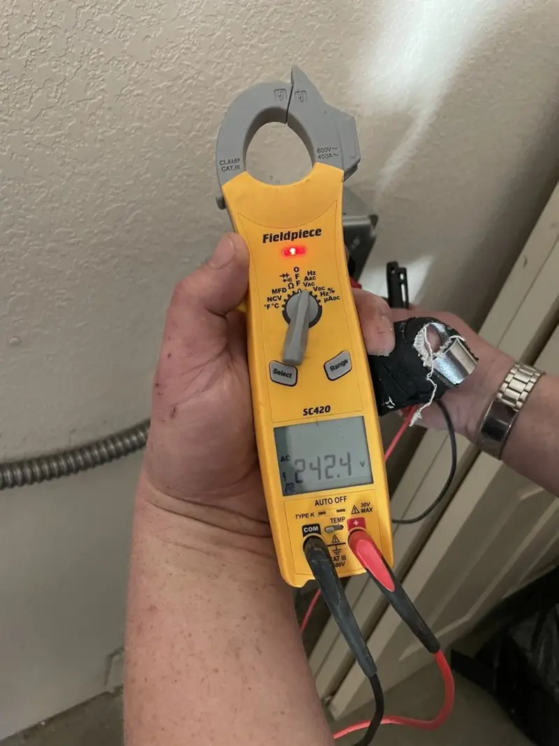 Voltage testing with clamp meter during Hot Tub / Pool Electrical Wiring in Excelsior Springs